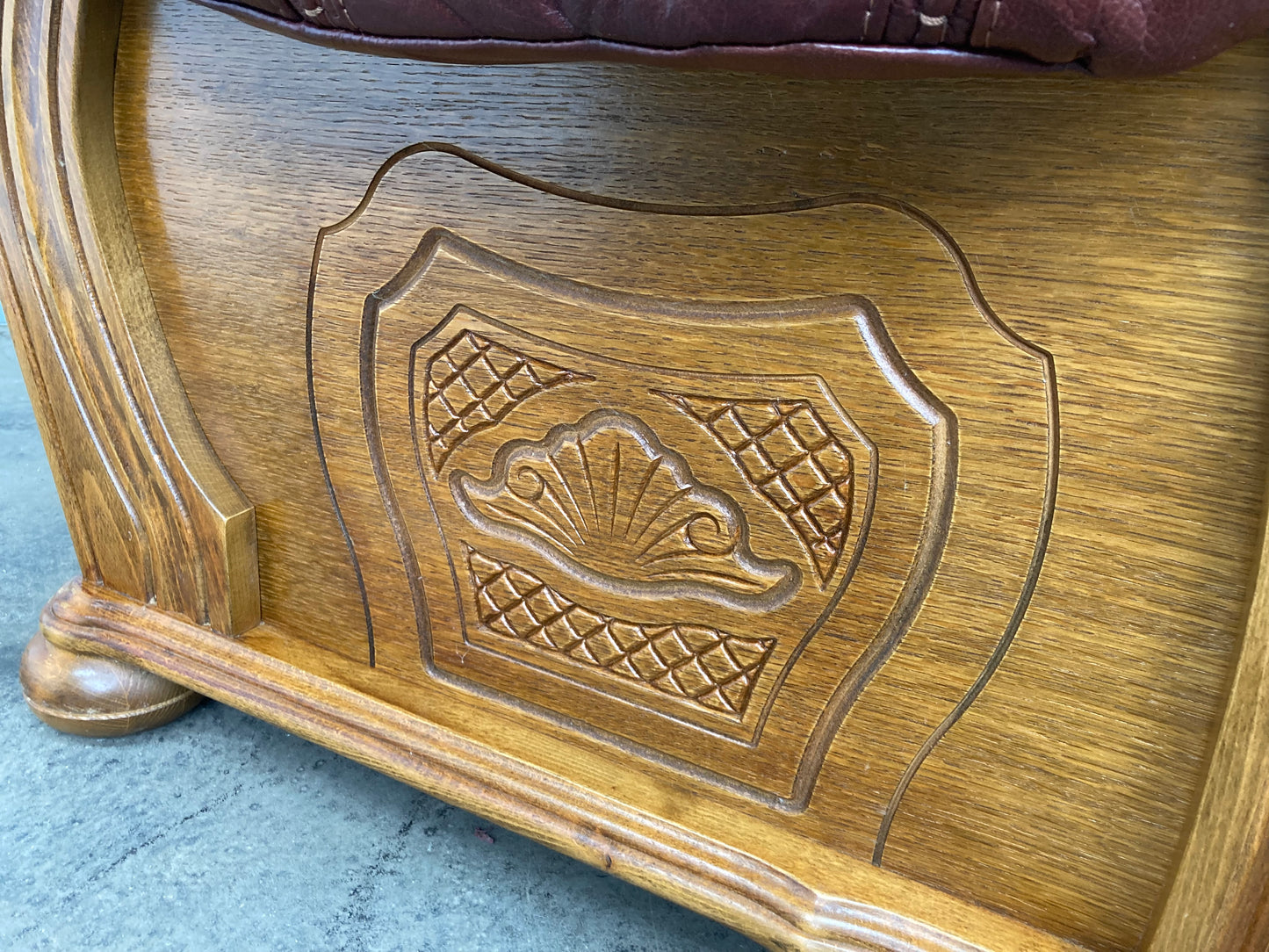 Brown leather Belgium armchair solid oak carved frame with storage drawer