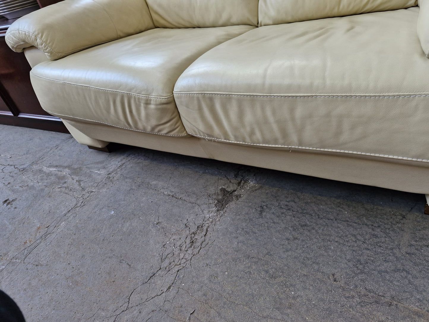 Cream leather 2 seater sofa